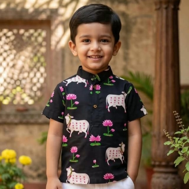 Snowflakes Boys Half Sleeve Cotton Short Kurta With Cow And Flower Prints - Black Snowflakes Boys Half Sleeve Cotton Short Kurta With Cow And Flower Prints - Black